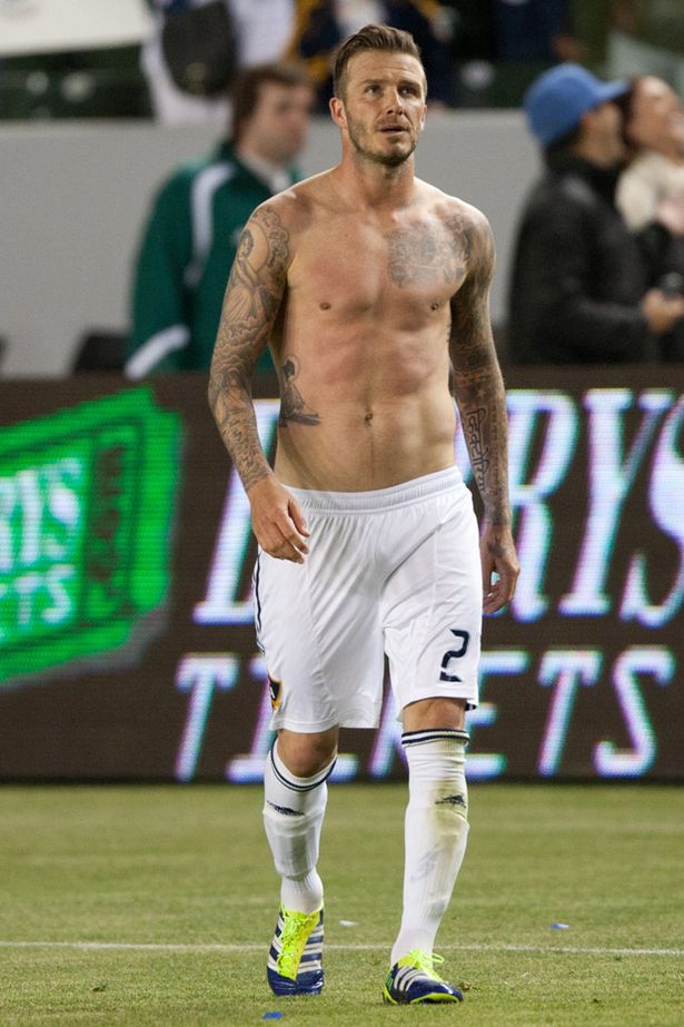 david-beckham-walks-off-the-pitch-shirtless-after-the-mls-game-between-the-los-a.jpg